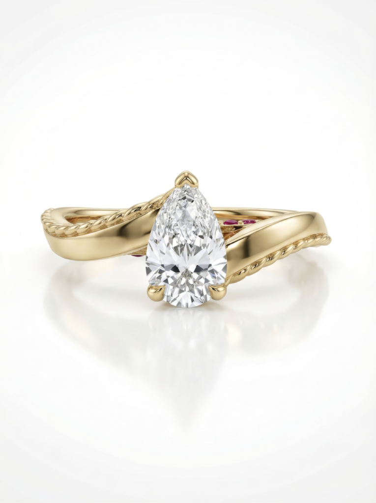 Little Bird engagement ring yellow gold pear diamond